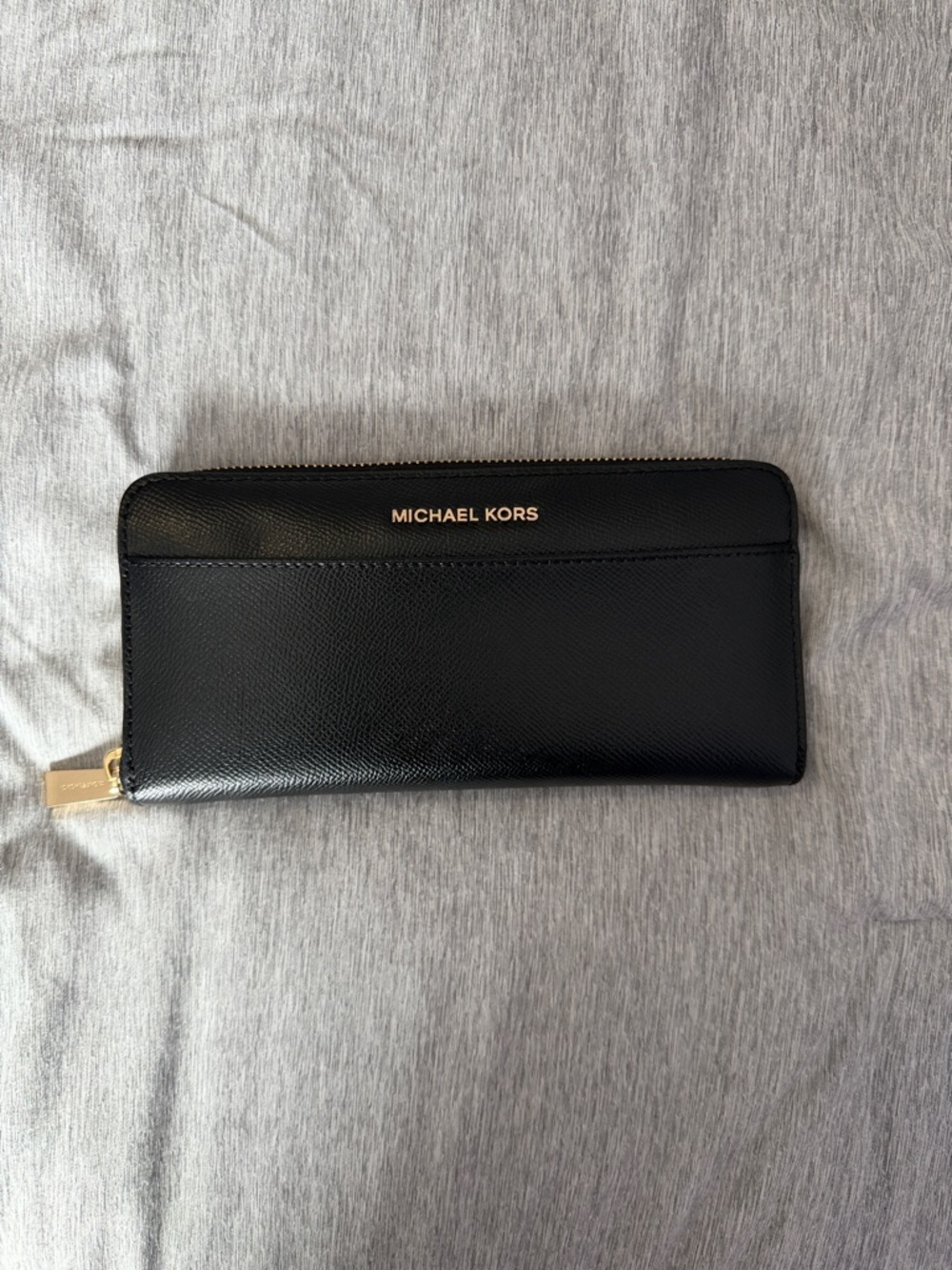 Michael Kors Black Zip Around Saffiano Wallet with Gold Logo